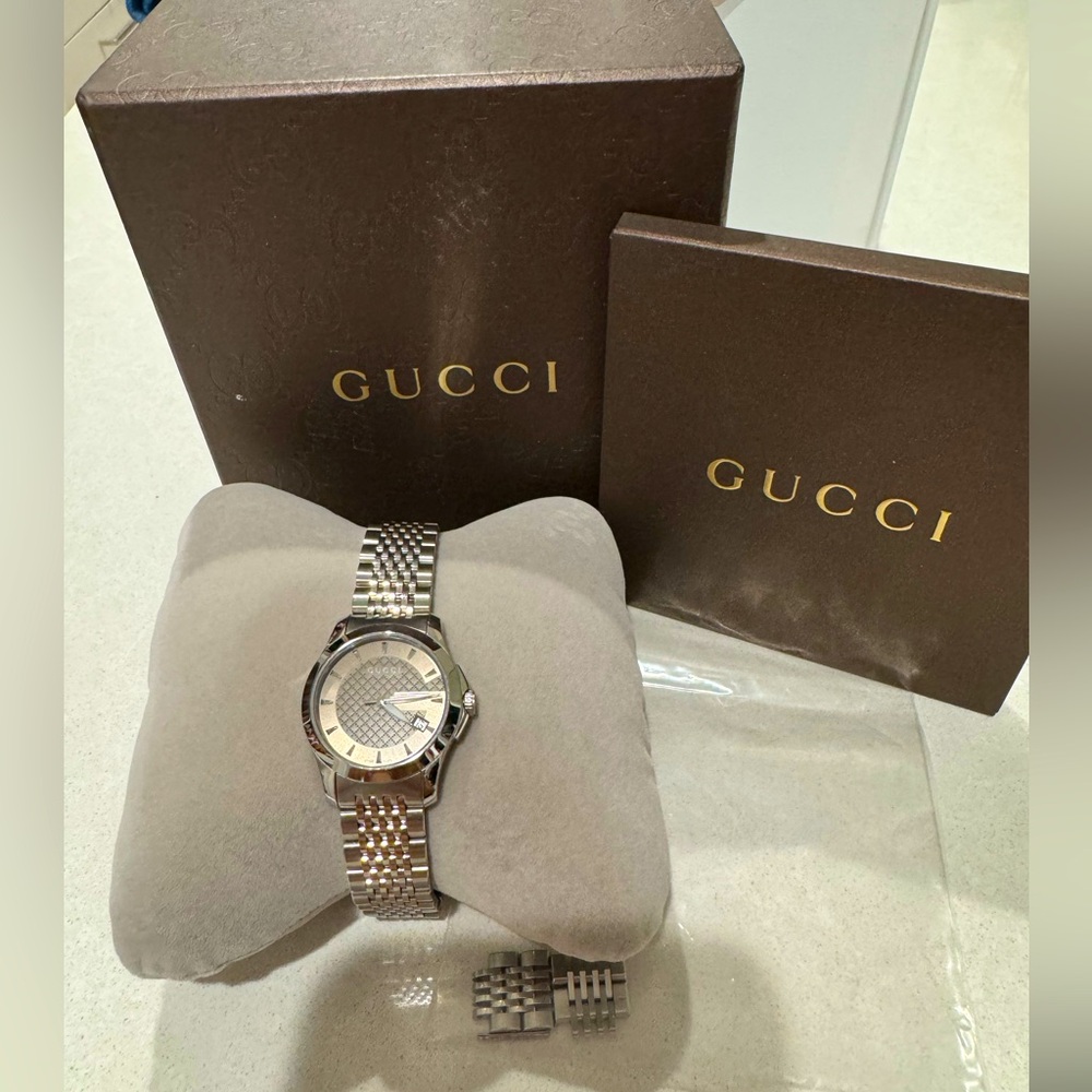 Gucci G Timeless Brown Dial Silver Steel Strap Watch For Women. Gently used
